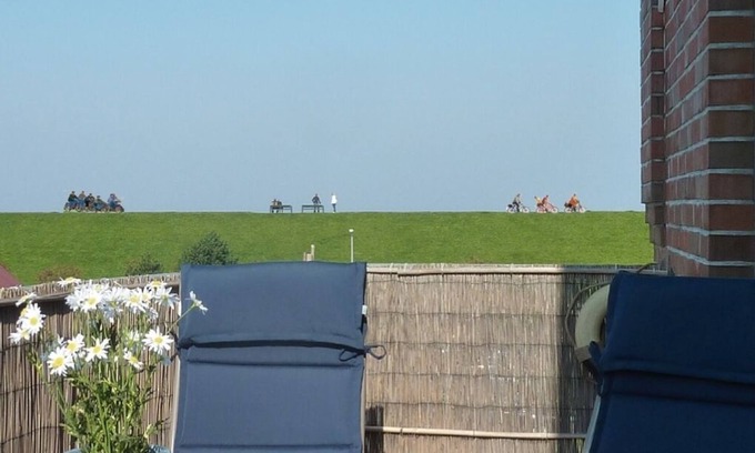 Norddeich Appartement | Le 4 **** FeWo - 1 à 4 personnes est à seulement 100 mètres de la mer du Nord