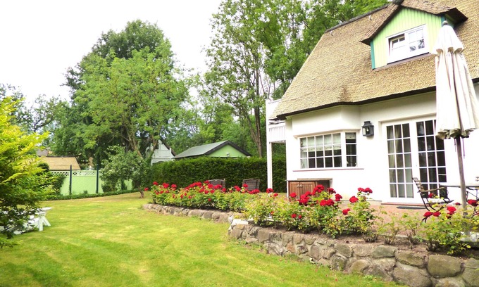 Klein Bollhagen Maison | Maison de vacances "Phare" 2-4 personnes avec cheminée, internet WiFi et grand jardin