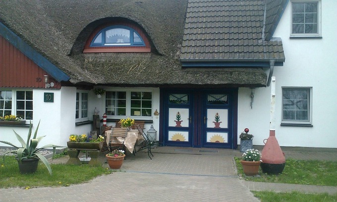 Wieck auf dem Darss Appartement | 50 m² attic apartment with a view of the harbor and Bodden - dormer apartment