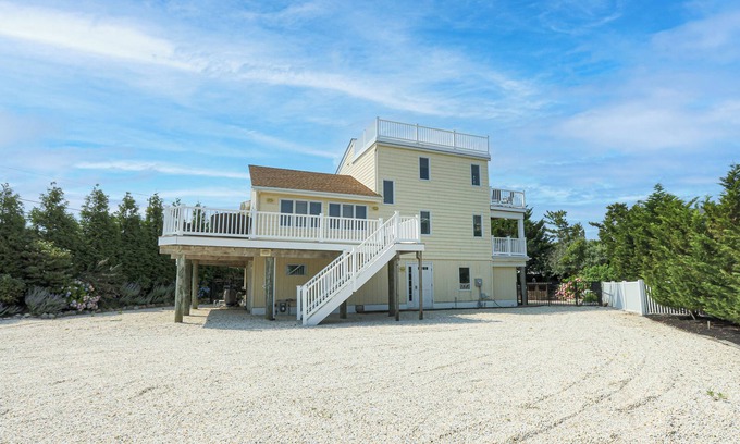 Loveladies Maison | 6-bedroom LBI house w heated pool, ocean views, outdoor entertaining area