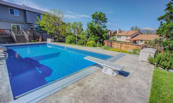 Briargate Maison | 6BR with Pool & Water Slide, Hot Tub, Peak View