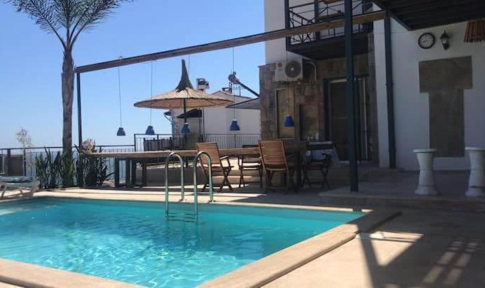 Phitsanulok Appartement | A house with a swimming pool and a garden. Free barbecue place