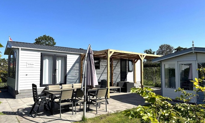 Sint Maarten Maison | A modern chalet on a spacious plot with a garden shed and electricity for your e-bikes.