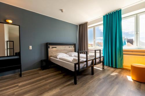 St. Ulrich Hôtel | a&o München Laim
