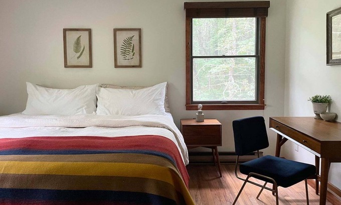 Yulan Cabine | A peaceful, quaint cabin in the woods offers a country-side escape for couples, small families, and friends.