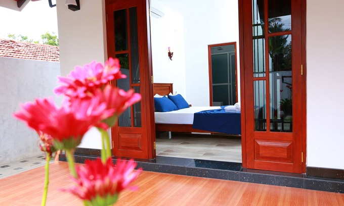 Daluwakotuwa Villa | une maison privée avec un jardin