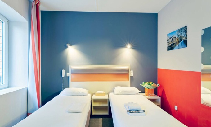 Contades Hôtel | A short drive to Rohrschollen Nature Reserve! Close to Place du Marché Gayot!