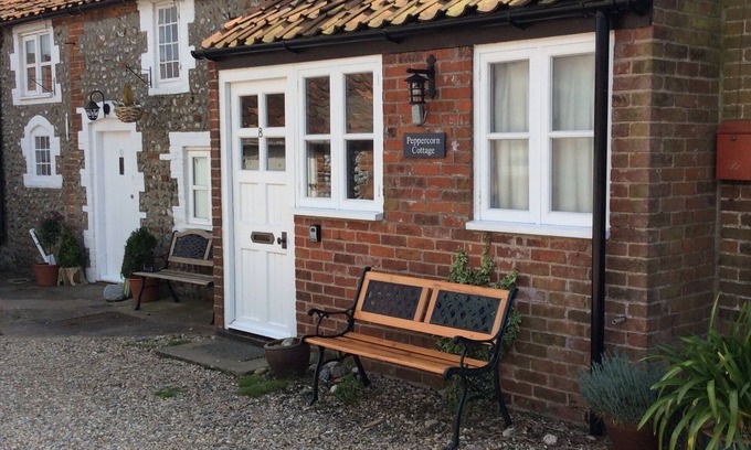 Bodham Cottage | Un traditionnel en briques et silex North Norfolk Cottage
