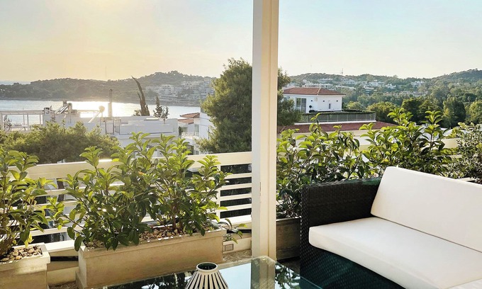 Vouliagmeni Appartement | A unique 3 level penthouse with a great sea view to Vouliagmeni Bay