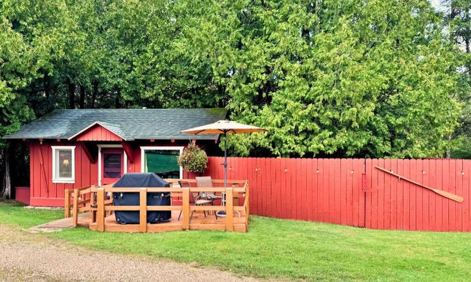 Trout Lake Cabine | Adorable Cabin #4 at Twin Cedars Resort in Trout Lake, MI with row boat and AC