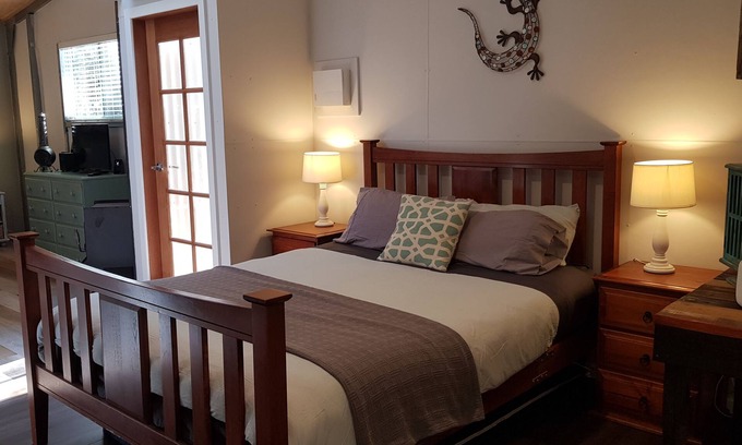 Wallagoot Maison | Adorable Guest House with fireplace in forest setting. One or two Queen Beds.