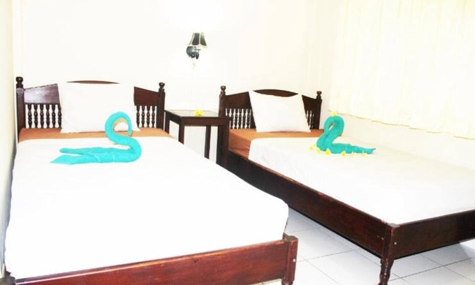 Downtown Kuta Maison | Maison d'hôtes abordable au cœur de Poppies Lane, Legian (SGRSDH)