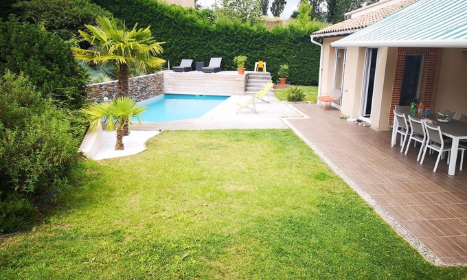 Saint-Jean Villa | Agréable Maison avec piscine chauffée, grande terrasse et terrain de pétanque.