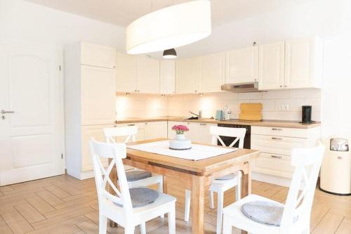 Eyendorf Maison | Ahrentschildt's Ferienwohnung im Reetdachhaus