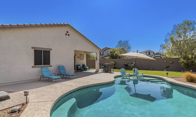 Buckeye Maison | Airy desert home with an enclosed yard, private pool, hot tub, firepit, & W/D