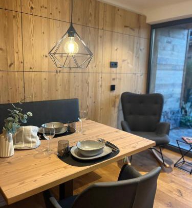 Kranzegg Appartement | Alpinum Chalet mit privater Außensauna