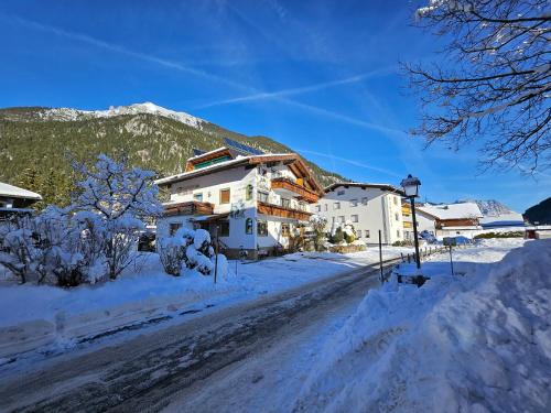 Bichlbach Maison | am Mühlbach - Ferienwohnungen Luttinger