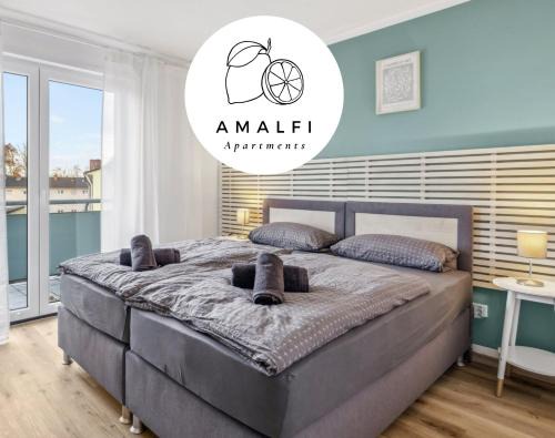 Kaiserslautern Appartement | Amalfi A02 - 2 Zi für 4P - Balkon, smart TV, Boxspringbett