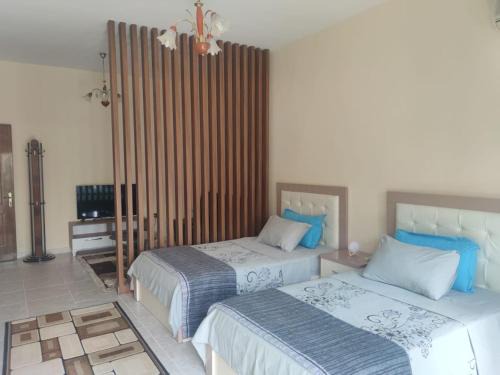 Mbrostar-Urë Appartement | Ami guest house