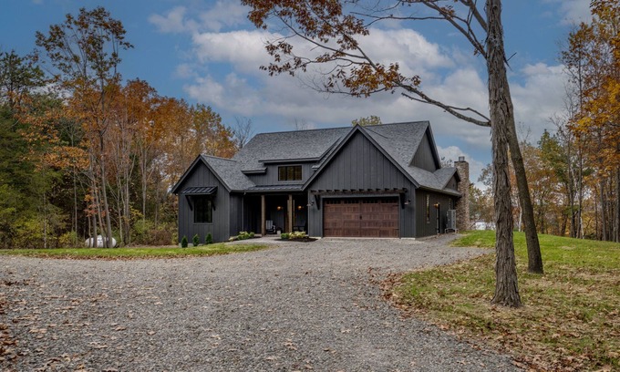 Valois Maison | Among the Oaks: Newly built Luxury home with game room, wooded setting overlooking Seneca lake