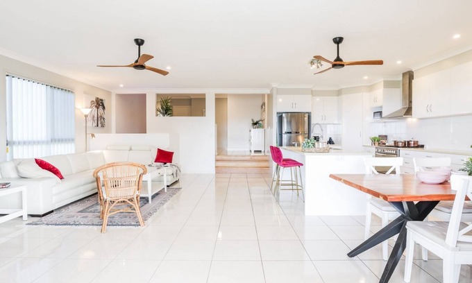 Agnes Water Maison | AMORE HOLIDAY HOUSE - Stunning family property capturing sea breezes & ocean views.