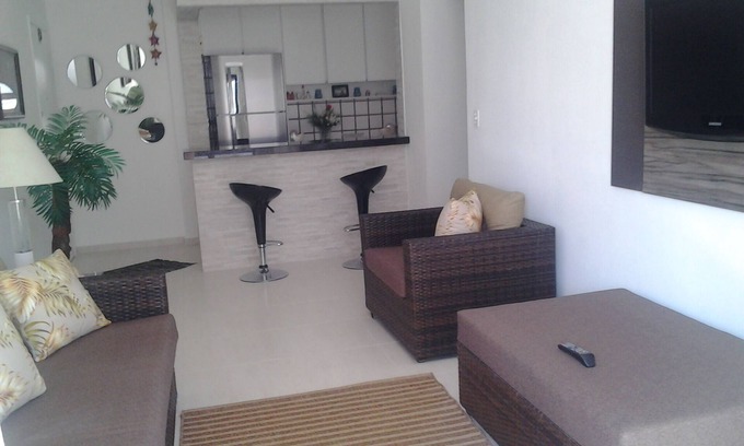 Tombo Appartement | Ample ap. Praia do Tombo 1 lit 02 lits. avec balcon cuisine américaine à 150m de la ma