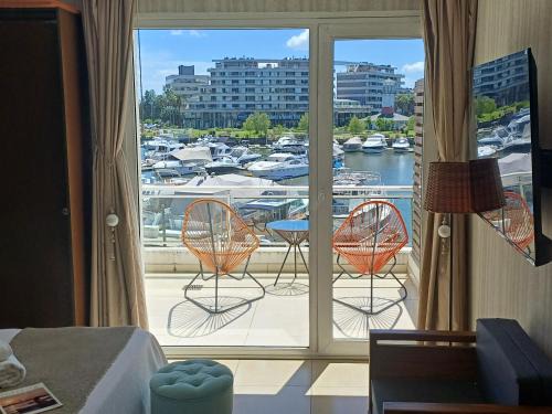 Nordelta Appartement | Apart , Departamento condominio en Bahia grande Nordelta con balcon y vista a la bahia