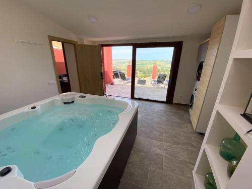 Talavera Appartement | Apartament1 Ca la Maru amb jacuzzi comunitari