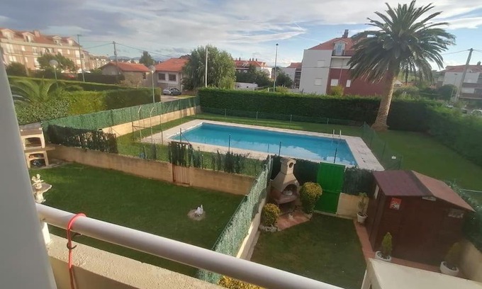 Suances Appartement | Apartamento céntrico con piscina y garaje