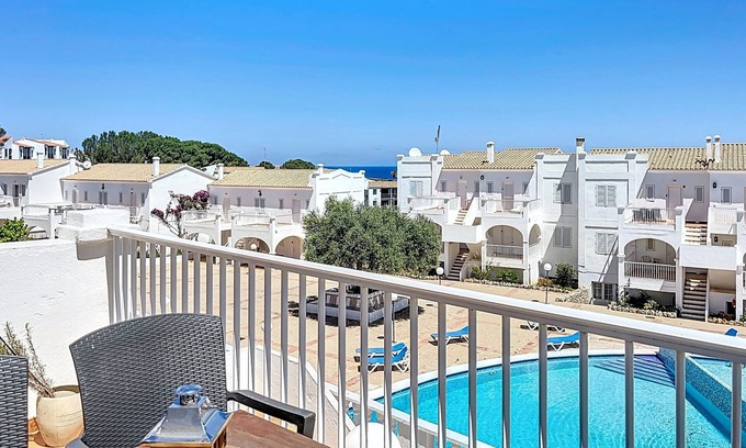 Arenal d'en Castell Appartement | Apartamento con Piscina y Solarium