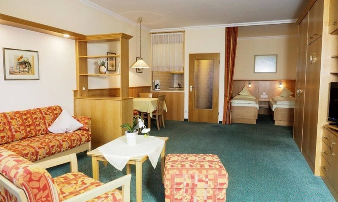 Bad Griesbach-Therme Appartement | Apartment with balcony or terrace - bathrobe access to the thermal baths possible.