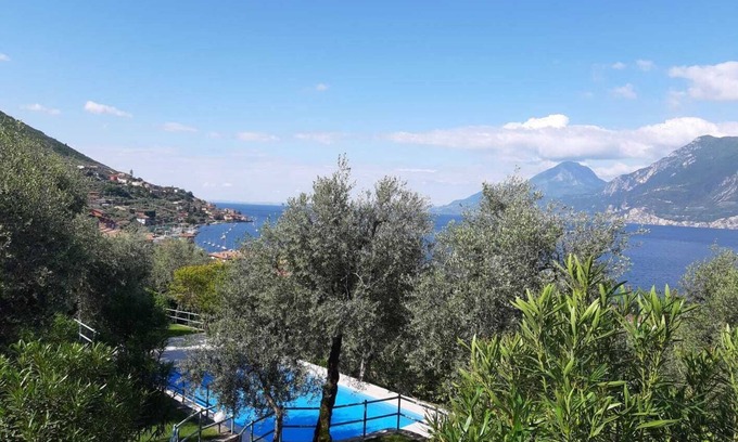 Assenza Appartement | Appartement avec vue sur le lac, piscine, garage et jardin privé