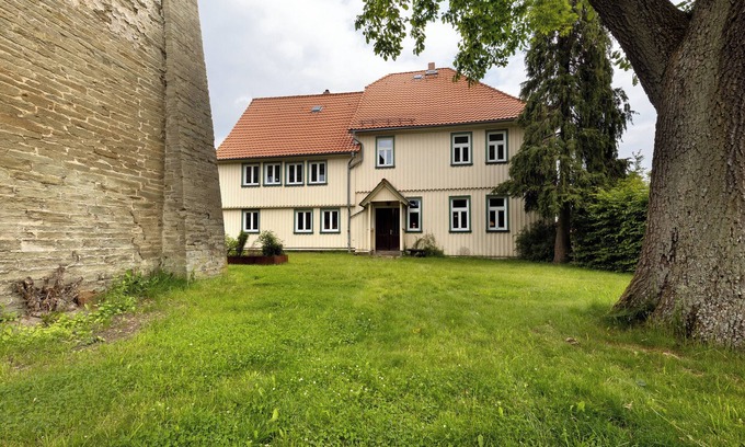 Huttenrode Appartement | Appartement 'Altes Pfarrhaus - Wohnung Farbwelt' avec jardin privé et Wi-Fi