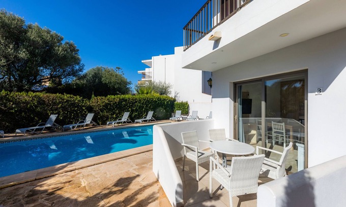 Cala Ferrera Appartement | Appartement 'Aquamarina 3' avec piscine partagée, Wi-Fi et climatisation.