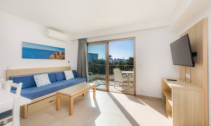 Cala Ferrera Appartement | Appartement 'Aquamarina 8' avec piscine partagée, Wi-Fi et climatisation.