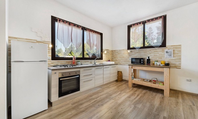 Iglesias Appartement | Appartement "Casa di Ale, Gabry e Nina" avec terrasse partagée et Wi-Fi
