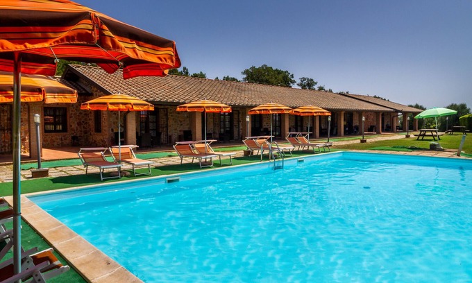 La Pesta Appartement | Appartement 'Casa Vacanza Il Carpignone 1' avec vue sur le lac, piscine et jardin