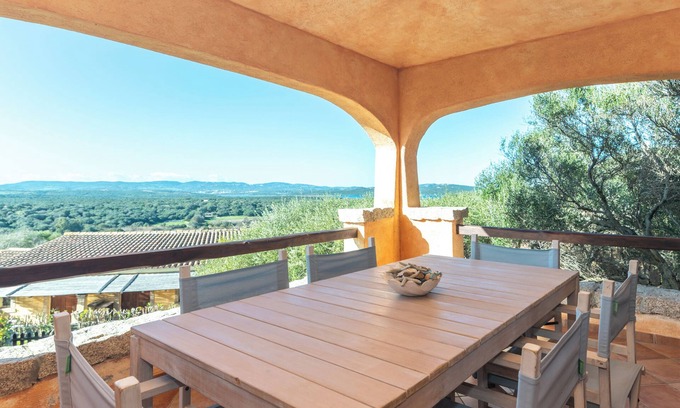 Porto Pollo Appartement | Appartement 'Casa Lauretta' avec vue sur la mer, piscine partagée et climatisation