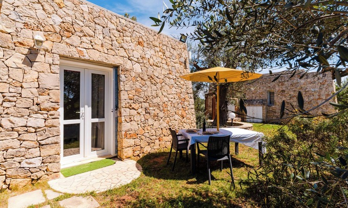 Tuglie Appartement | Appartement 'Classic Dépendance - Angolo Cottura' avec piscine partagée, Wi-Fi et climatisation