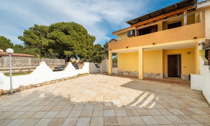 Porto Pino Appartement | Appartement 'Ella' avec terrasse privée, jardin privé et balcon