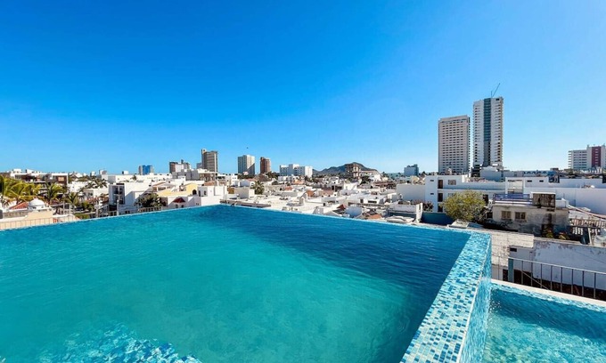 Zona Dorada Appartement | Apartment for 7 people with pool on the 3rd floor