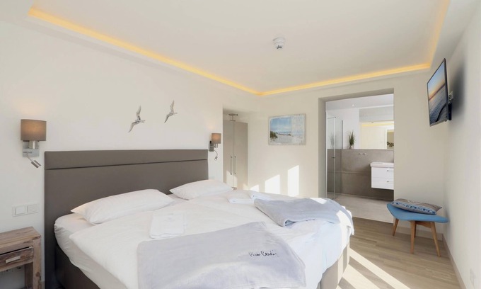 Prora Appartement | Appartement "Gardensuite Binz" avec piscine, Wi-Fi et terrasse