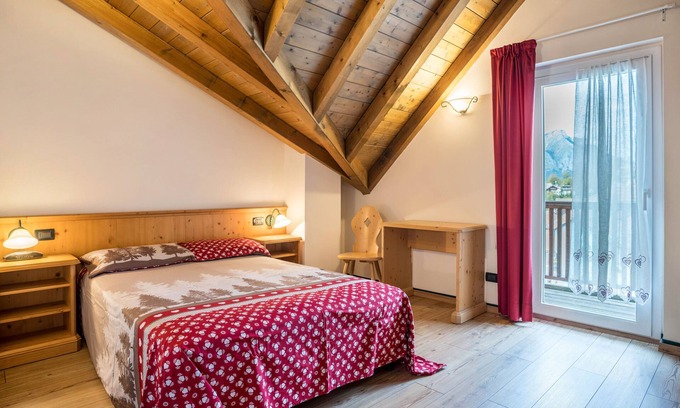 Gionghi-Cappella Appartement | Appartement 'Giongo Residence Aparthotel 104' avec vue sur la montagne, terrasse partagée et Wi-Fi