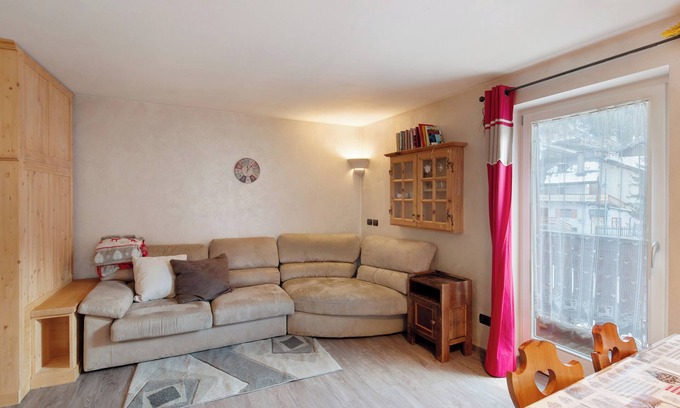 Canazei Appartement | Appartement 'Giulia' avec vue sur les montagnes, jardin partagé et balcon