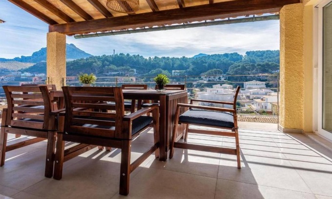 Cala San Vicente Appartement | Appartement "Guillem", avec vue sur la mer, jardin et Wi-Fi.