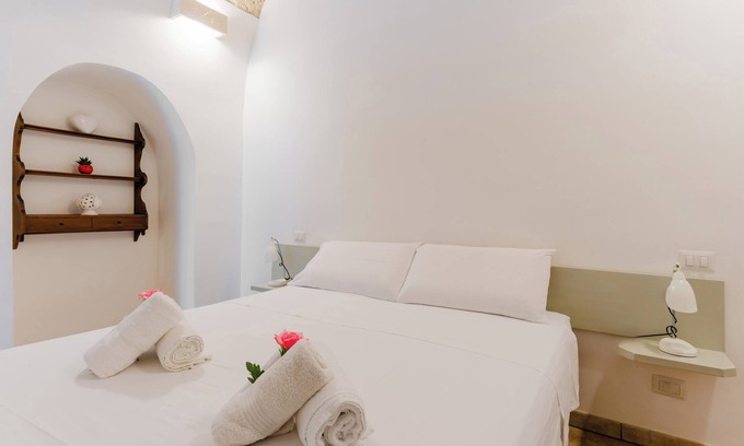 Tuglie Appartement | Appartement "Helga" avec terrasse partagée, Wi-Fi et climatisation