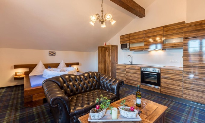 Hopfen am See Appartement | Apartment "Highlander Suite" in the Vitusfort house