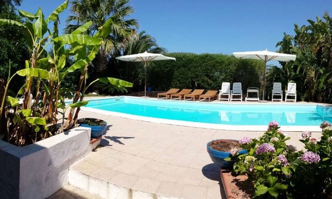 Porto San Paolo Appartement | Appartement avec piscine privée donnant sur TAVOLARA
