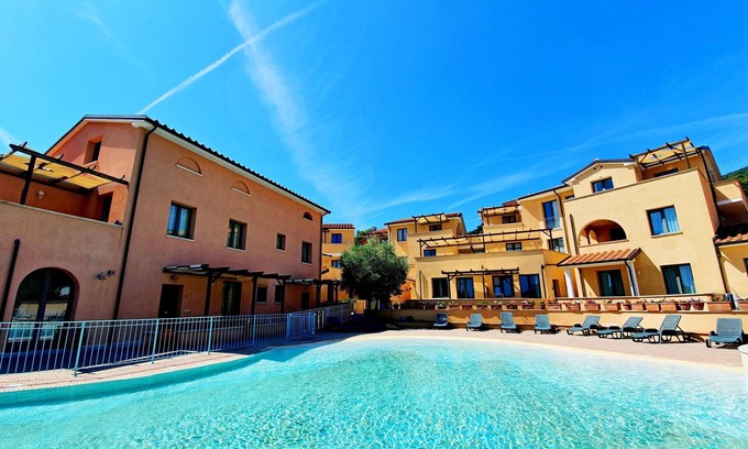 Cavo Appartement | Appartement 'La Pergola al Cavo 9' avec vue sur la mer, piscine partagée, terrasse et Wi-Fi
