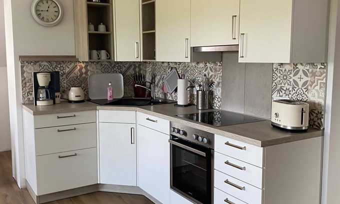 Brookmerland Appartement | Apartment 'Landhaus Alte Welt Nordseeküste 2' with Private Terrace and Wi-Fi